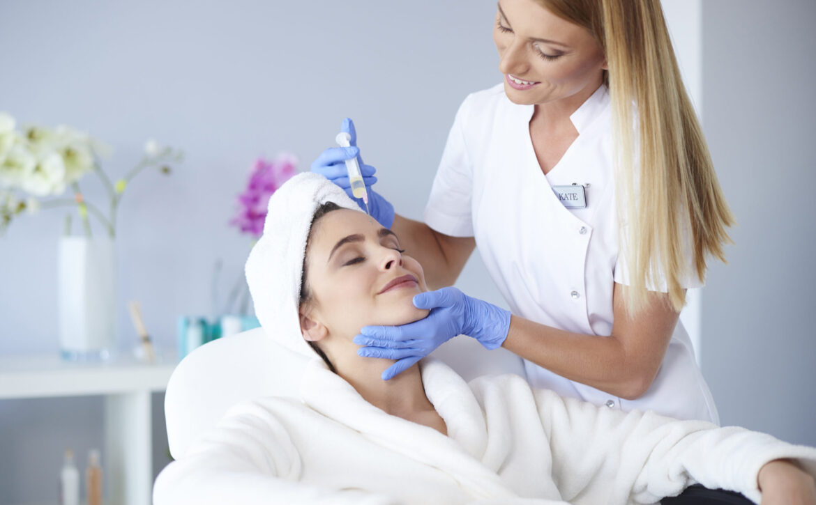 Woman receiving botox injection in clinic